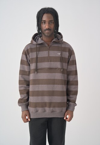 Cleptomanicx Kapuzenpullover in Braun: Vorderseite