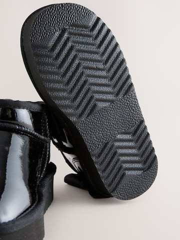 Bottes Next en noir