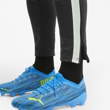 Slimfit Pantaloni sportivi 'TeamLiga' di PUMA in nero