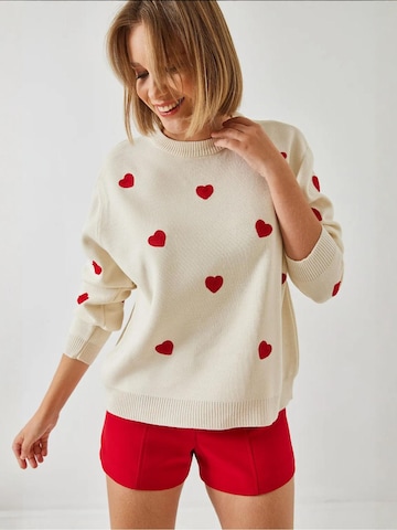 Pull-over 'Pullover' Bianco Lucci en beige : devant