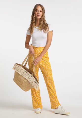 Loosefit Pantaloni di IZIA in giallo