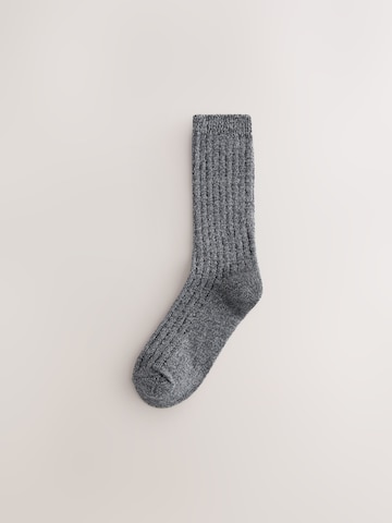 Next Sockor i blå