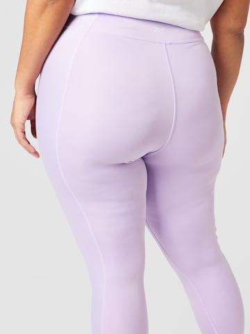 Reebok Skinny Spodnie sportowe w kolorze fioletowy