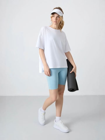 Tommy Life - Tapered Leggings 'Gamaschen' em azul