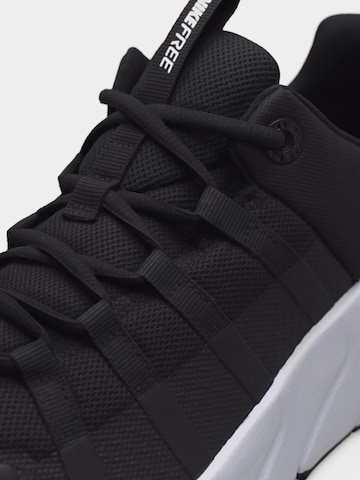 Chaussure de course 'Free Metcon 7' NIKE en noir