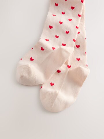 Ștrampi de la Next pe bej