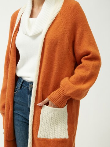 Cardigan Influencer en orange