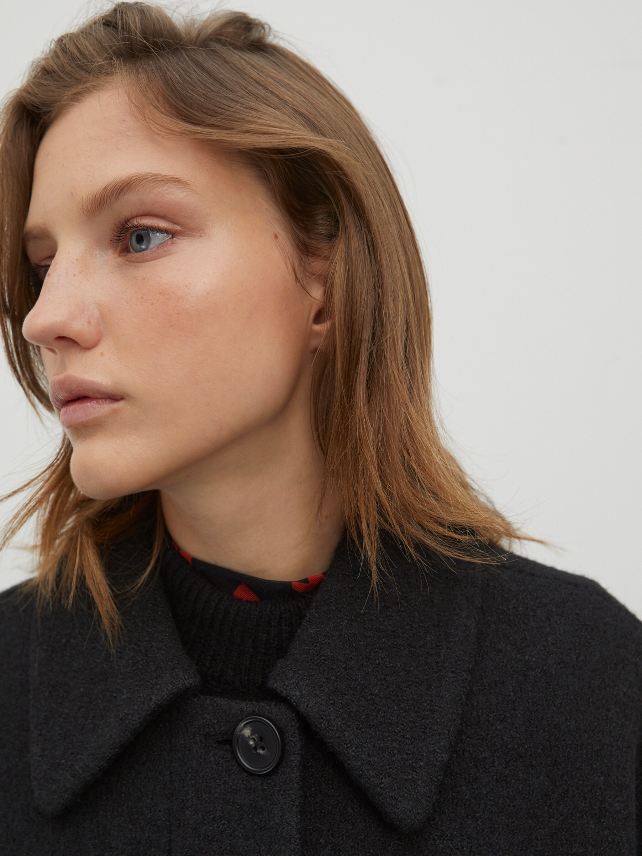 EDITED Producten Tussenmantel 'Una' Zwart