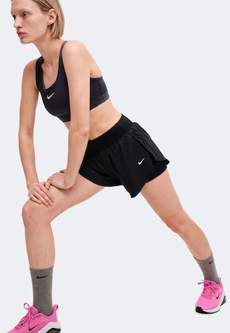 NIKE Skinny Παντελόνι φόρμας 'SCULPT' σε μαύρο: πλευρά