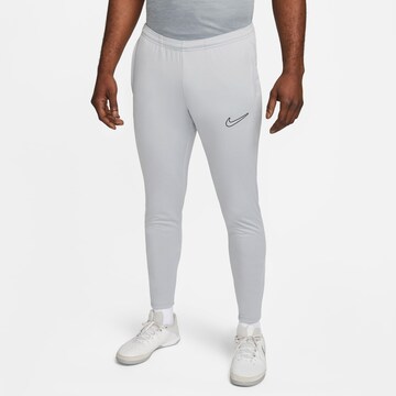 NIKE Slim fit Workout Pants 'Academy' in Grey: front