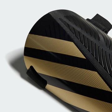 ADIDAS PERFORMANCE - Protector 'Tiro' en negro