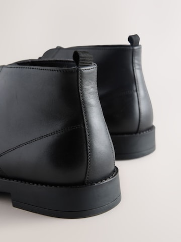 Next - Botines chukka en negro