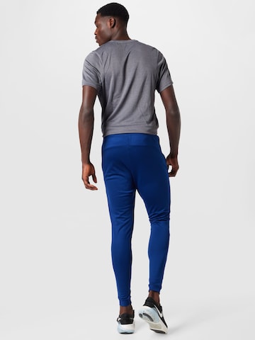 NIKE Trainingsanzug in Blau