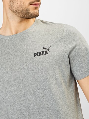 PUMA Funkčné tričko 'Essentials' - Sivá