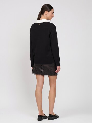 Influencer - Jersey en negro