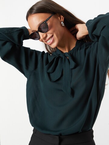 ABOUT YOU Blouse 'Laura' in Green