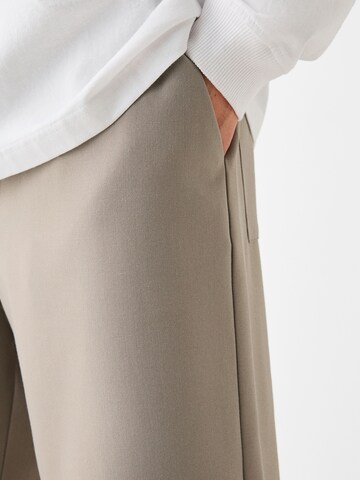 Loosefit Pantaloni di Bershka in beige