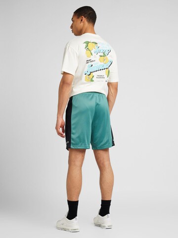 Nike Sportswear Štandardný strih Nohavice 'AIR' - Zelená