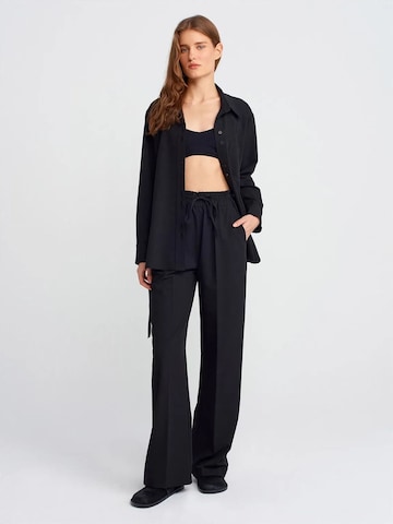 Dilvin Wide leg Trousers in Black