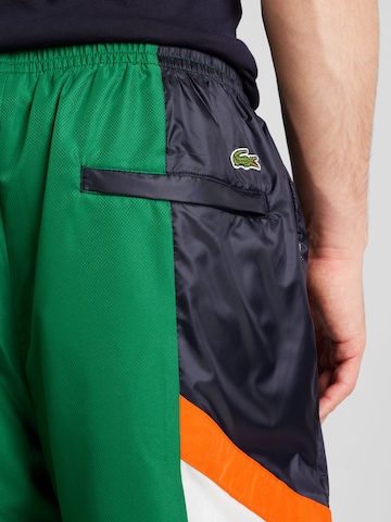 LACOSTE - Tapered Pantalón en verde