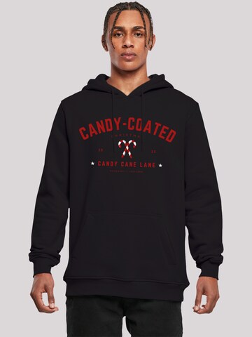 Sweat-shirt 'Candy Coated Christmas' F4NT4STIC en noir : devant