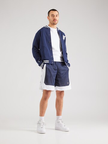 Champion Authentic Athletic Apparel Loosefit Kalhoty – modrá