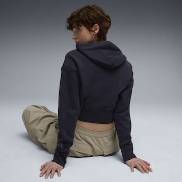 PUMA Sweatshirt 'Premium Essentials' in Blauw