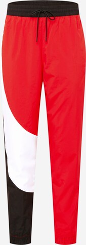 PUMA Tapered Workout Pants 'Clyde' in Red: front