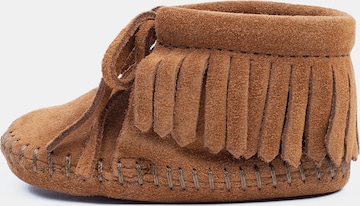 Minnetonka Slippers in Brown