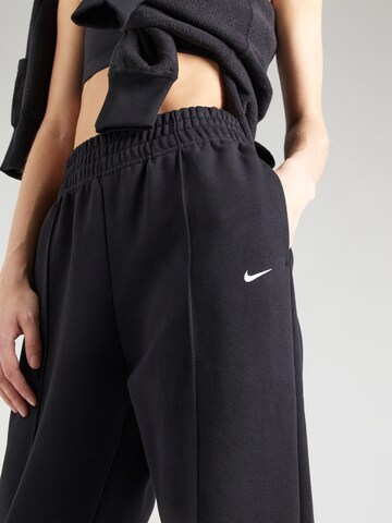 Tapered Pantaloni de la Nike Sportswear pe negru