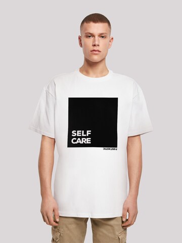 T-Shirt 'SELF CARE' F4NT4STIC en blanc : devant