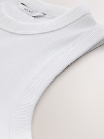 Next Top | bela barva