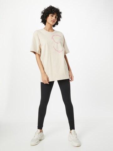 ADIDAS BY STELLA MCCARTNEY - Camiseta funcional en beige