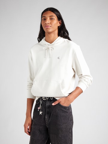 Sweat-shirt Calvin Klein Jeans en blanc : devant
