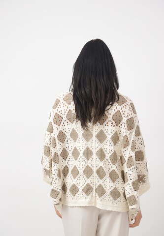 Elara Oversized cardigan i beige
