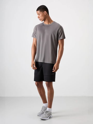 T-Shirt fonctionnel 'T-Shirts' Tommy Life en gris