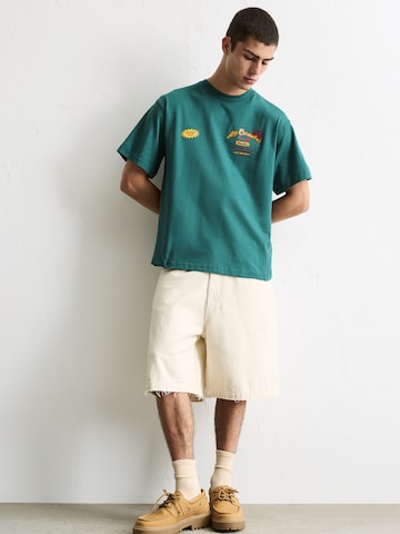 Pull&Bear Koszulka 'AY CARMELA' w kolorze zielony
