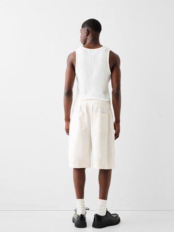 Bershka Regular Pleat-front trousers in White