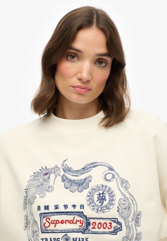 Sweat-shirt 'Tokyo Narrative' Superdry en blanc