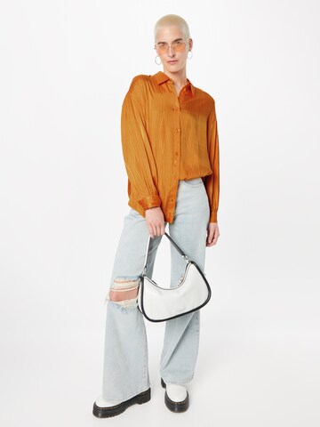Monki Blus i orange