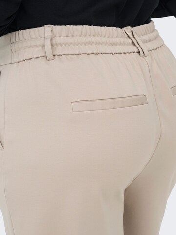 regular Pantaloni di ONLY Carmakoma in beige