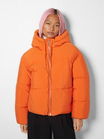 Bershka Winter Jacket in Orange: front