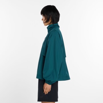Veste de sport 'Trackside Woven Jacket' new balance en vert
