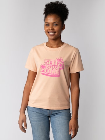 T-shirt 'Self love Club' Watapparel en orange : devant