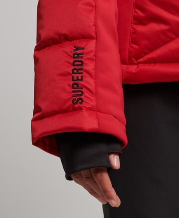 Superdry Outdoorjas 'Snow Luxe' in Rood