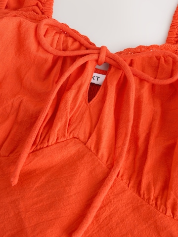 Next Zomerjurk in Rood