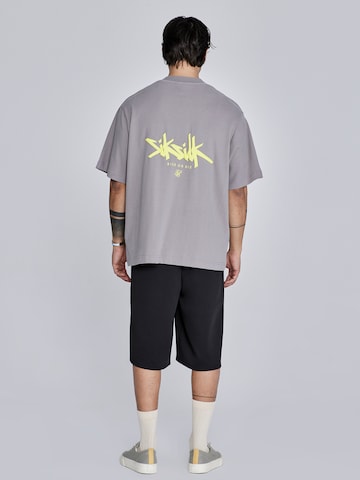 Maglietta di SikSilk in grigio