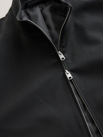 Next Jacke 'Motionflex' in Schwarz