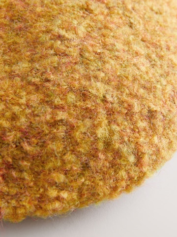 Next Pipo värissä keltainen