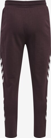 Tapered Pantaloni sportivi 'Legacy' di Hummel in marrone